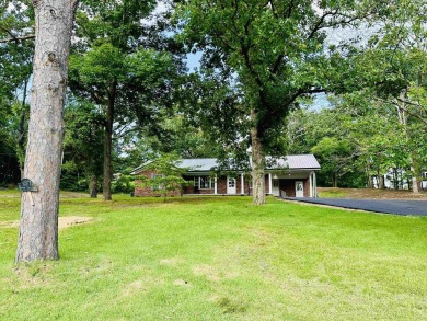 Experience luxury living in this completely remodeled 4-bedroom on Selmer Golf and Country Club in Tennessee - for sale on GolfHomes.com, golf home, golf lot