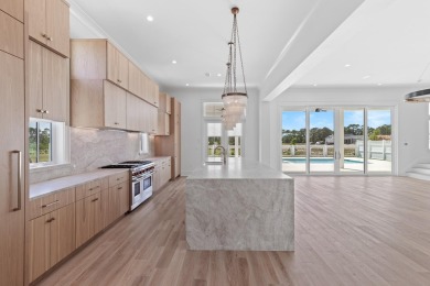 Indulge in the ultimate Florida lifestyle with the Darien plan on Origins Golf Club in Florida - for sale on GolfHomes.com, golf home, golf lot