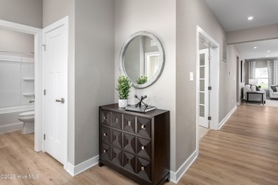 Step into style and comfort with this beautifully designed ranch on Sea Trail Golf Resort in North Carolina - for sale on GolfHomes.com, golf home, golf lot