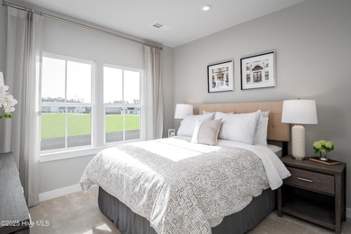 Step into style and comfort with this beautifully designed ranch on Sea Trail Golf Resort in North Carolina - for sale on GolfHomes.com, golf home, golf lot