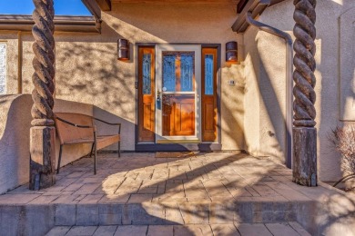 Enter this lovely home through the private courtyard to the on Desert Hawk At Pueblo West in Colorado - for sale on GolfHomes.com, golf home, golf lot