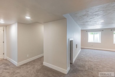 Discover this spacious 6-bedroom, 3-bathroom home nestled in the on Teton Lakes Golf Courses in Idaho - for sale on GolfHomes.com, golf home, golf lot