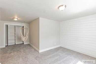 Discover this spacious 6-bedroom, 3-bathroom home nestled in the on Teton Lakes Golf Courses in Idaho - for sale on GolfHomes.com, golf home, golf lot