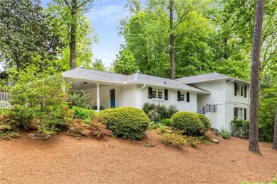 Nestled on a large + acre serene, corner lot in the highly on Bobby Jones Golf Club in Georgia - for sale on GolfHomes.com, golf home, golf lot