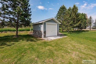 Discover this spacious 6-bedroom, 3-bathroom home nestled in the on Teton Lakes Golf Courses in Idaho - for sale on GolfHomes.com, golf home, golf lot