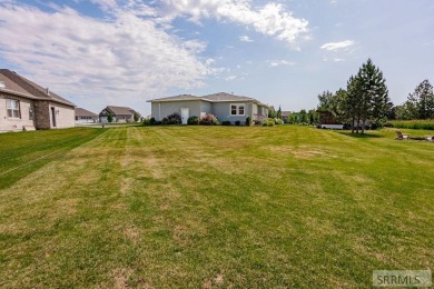 Discover this spacious 6-bedroom, 3-bathroom home nestled in the on Teton Lakes Golf Courses in Idaho - for sale on GolfHomes.com, golf home, golf lot