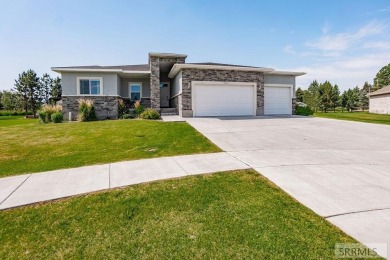 Discover this spacious 6-bedroom, 3-bathroom home nestled in the on Teton Lakes Golf Courses in Idaho - for sale on GolfHomes.com, golf home, golf lot