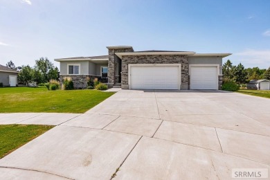 Discover this spacious 6-bedroom, 3-bathroom home nestled in the on Teton Lakes Golf Courses in Idaho - for sale on GolfHomes.com, golf home, golf lot