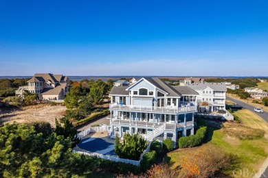 With sweeping 180-degree views of the Atlantic Ocean, this on The Currituck Golf Club in North Carolina - for sale on GolfHomes.com, golf home, golf lot