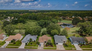 IN TIMBER GREENS A 55+ GATED GOLF COMMUNITY..... This charming on Timber Greens Country Club in Florida - for sale on GolfHomes.com, golf home, golf lot