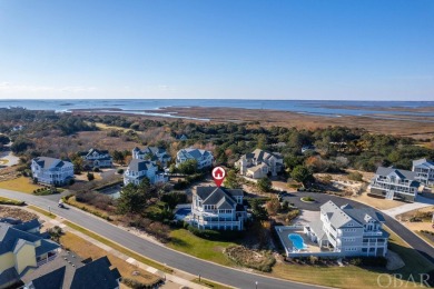 With sweeping 180-degree views of the Atlantic Ocean, this on The Currituck Golf Club in North Carolina - for sale on GolfHomes.com, golf home, golf lot