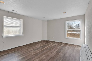 Enter this lovely home through the private courtyard to the on Desert Hawk At Pueblo West in Colorado - for sale on GolfHomes.com, golf home, golf lot