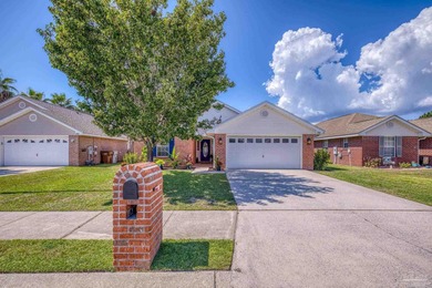 Welcome home to this beautifully updated Gulf Breeze gem, tucked on Tiger Point Golf and Country Club in Florida - for sale on GolfHomes.com, golf home, golf lot