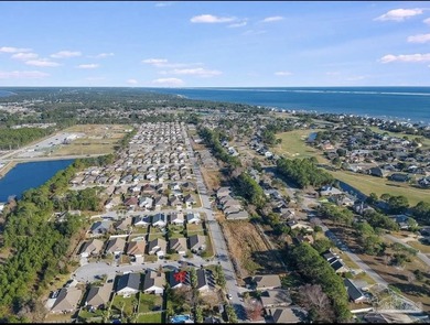 Welcome home to this beautifully updated Gulf Breeze gem, tucked on Tiger Point Golf and Country Club in Florida - for sale on GolfHomes.com, golf home, golf lot