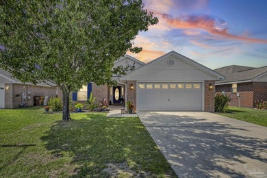 Welcome home to this beautifully updated Gulf Breeze gem, tucked on Tiger Point Golf and Country Club in Florida - for sale on GolfHomes.com, golf home, golf lot
