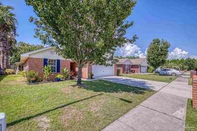Welcome home to this beautifully updated Gulf Breeze gem, tucked on Tiger Point Golf and Country Club in Florida - for sale on GolfHomes.com, golf home, golf lot