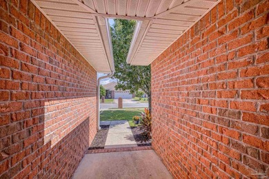 Welcome home to this beautifully updated Gulf Breeze gem, tucked on Tiger Point Golf and Country Club in Florida - for sale on GolfHomes.com, golf home, golf lot