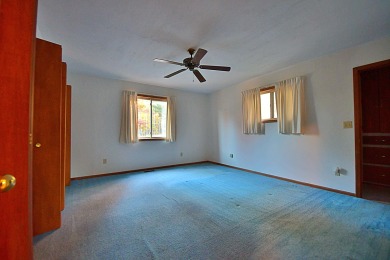 Enjoy golf course living with this charming 2-bedroom, 2-bath on Birch Pointe Golf Club in Michigan - for sale on GolfHomes.com, golf home, golf lot