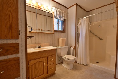 Enjoy golf course living with this charming 2-bedroom, 2-bath on Birch Pointe Golf Club in Michigan - for sale on GolfHomes.com, golf home, golf lot