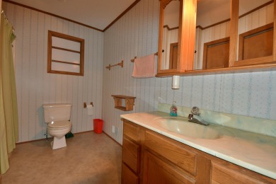 Enjoy golf course living with this charming 2-bedroom, 2-bath on Birch Pointe Golf Club in Michigan - for sale on GolfHomes.com, golf home, golf lot
