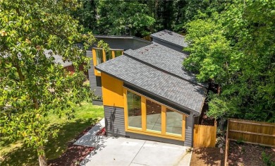 Stunning Mid-Century Modern Gem in Adams Park! Welcome to this on Alfred Tup Holmes Golf Course in Georgia - for sale on GolfHomes.com, golf home, golf lot