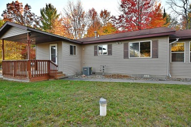 Enjoy golf course living with this charming 2-bedroom, 2-bath on Birch Pointe Golf Club in Michigan - for sale on GolfHomes.com, golf home, golf lot