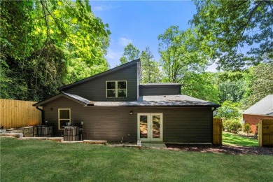 Stunning Mid-Century Modern Gem in Adams Park! Welcome to this on Alfred Tup Holmes Golf Course in Georgia - for sale on GolfHomes.com, golf home, golf lot