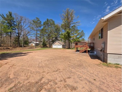 Welcome to 28811 Cr-H in Danbury -- where quality craftsmanship on Voyager Village Country Club - Voyager in Wisconsin - for sale on GolfHomes.com, golf home, golf lot