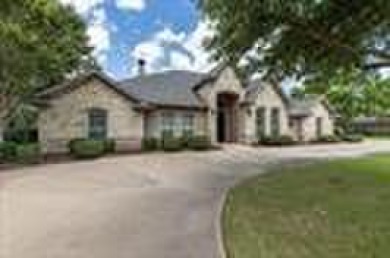 Beautiful home in coveted Pecan Plantation.  Open floor plan on Nutcracker Golf Club in Texas - for sale on GolfHomes.com, golf home, golf lot