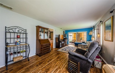 Under contract-accepting backup offers. STUNNING FIRST FLOOR on Gulf Harbors Golf Course in Florida - for sale on GolfHomes.com, golf home, golf lot