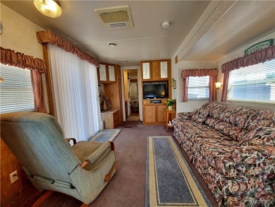 Charming Travel Trailer Retreat! This is more than just a on Riverview Golf Course in Arizona - for sale on GolfHomes.com, golf home, golf lot