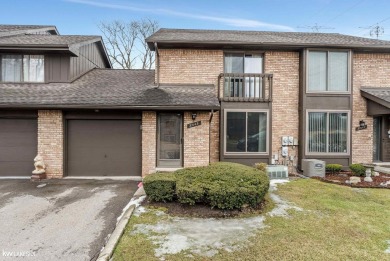 This beautifully maintained two-story condo features two on Plum Brook Golf Club in Michigan - for sale on GolfHomes.com, golf home, golf lot