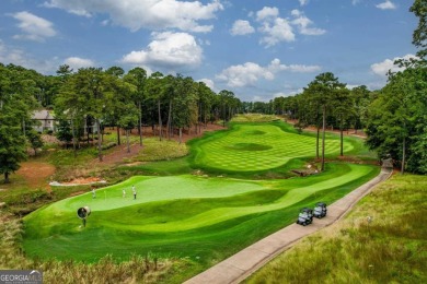 This stunning, turn-key, fully remodeled luxury townhome offers on Reynolds Lake Oconee - The Oconee in Georgia - for sale on GolfHomes.com, golf home, golf lot