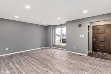 This beautifully maintained two-story condo features two on Plum Brook Golf Club in Michigan - for sale on GolfHomes.com, golf home, golf lot