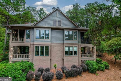 This stunning, turn-key, fully remodeled luxury townhome offers on Reynolds Lake Oconee - The Oconee in Georgia - for sale on GolfHomes.com, golf home, golf lot