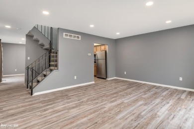This beautifully maintained two-story condo features two on Plum Brook Golf Club in Michigan - for sale on GolfHomes.com, golf home, golf lot