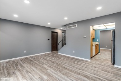 This beautifully maintained two-story condo features two on Plum Brook Golf Club in Michigan - for sale on GolfHomes.com, golf home, golf lot
