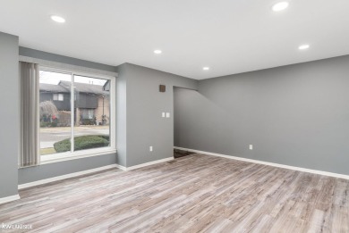 This beautifully maintained two-story condo features two on Plum Brook Golf Club in Michigan - for sale on GolfHomes.com, golf home, golf lot