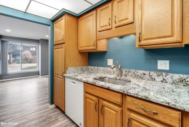 This beautifully maintained two-story condo features two on Plum Brook Golf Club in Michigan - for sale on GolfHomes.com, golf home, golf lot