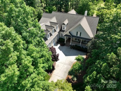 Experience the perfect blend of modern elegance at 154 on Old North State Club at Uwharrie Point Golf community in North Carolina - for sale on GolfHomes.com, golf home, golf lot