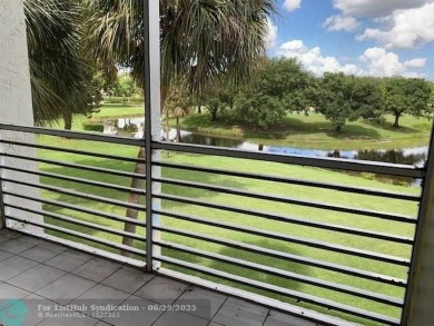 This is a 2/2 with a screened in patio and a great view of the on Pine Island Ridge Country Club in Florida - for sale on GolfHomes.com, golf home, golf lot