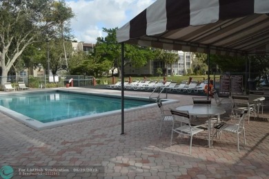 This is a 2/2 with a screened in patio and a great view of the on Pine Island Ridge Country Club in Florida - for sale on GolfHomes.com, golf home, golf lot