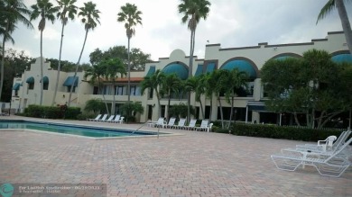 This is a 2/2 with a screened in patio and a great view of the on Pine Island Ridge Country Club in Florida - for sale on GolfHomes.com, golf home, golf lot