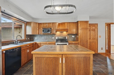 Listed by Lori Barnett, Engel & Volkers Black Hills, .   $20,000 on Meadowbrook Golf Course in South Dakota - for sale on GolfHomes.com, golf home, golf lot