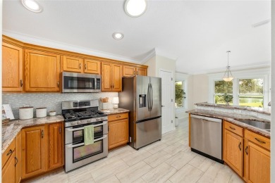 Golf Course  Pond Home For Sale in The Villages. A lot of great on The Links of Spruce Creek in Florida - for sale on GolfHomes.com, golf home, golf lot