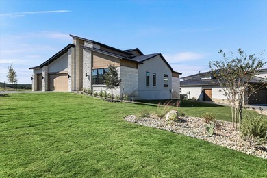 This newly constructed contemporary residence in Tuscan Village on Summit Rock Golf Course in Texas - for sale on GolfHomes.com, golf home, golf lot