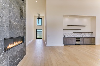 This newly constructed contemporary residence in Tuscan Village on Summit Rock Golf Course in Texas - for sale on GolfHomes.com, golf home, golf lot