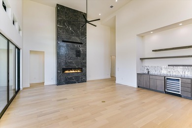 This newly constructed contemporary residence in Tuscan Village on Summit Rock Golf Course in Texas - for sale on GolfHomes.com, golf home, golf lot