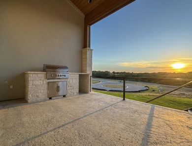 This newly constructed contemporary residence in Tuscan Village on Summit Rock Golf Course in Texas - for sale on GolfHomes.com, golf home, golf lot