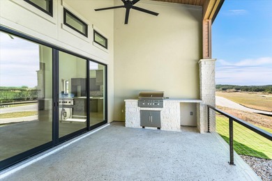 This newly constructed contemporary residence in Tuscan Village on Summit Rock Golf Course in Texas - for sale on GolfHomes.com, golf home, golf lot